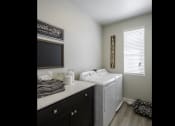 Thumbnail 26 of 34 - Laundry Room with Washer and Dryer