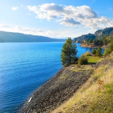 Beautiful View of Lakefront and Trees in Spokane, WA