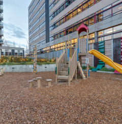 a playground in front of a building