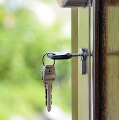 a door handle with keys hanging out of it