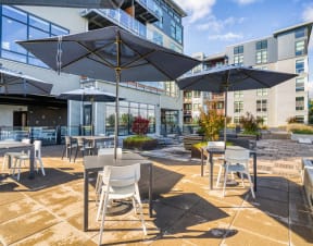 Harbor Sky Exterior and Patio with Tables and Chairs