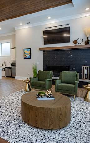 a living room with a couch and a table