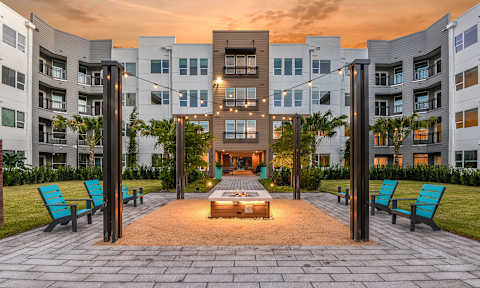 Courtyard with Fireside Seating at Lyra Luxury Apartments Near Ringling College Sarasota, FL