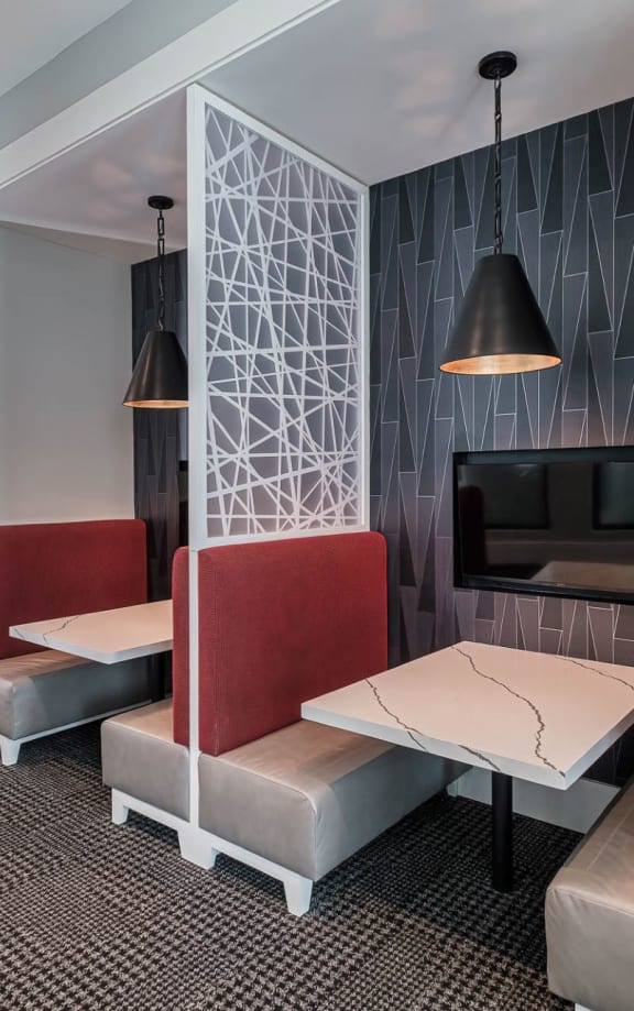 A room with a grey wall and a white geometric design on it. at Altis Twin Lakes Apartments, Kissimmee, FL 34744