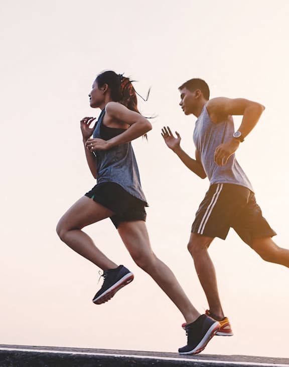 Man and Woman Running Together