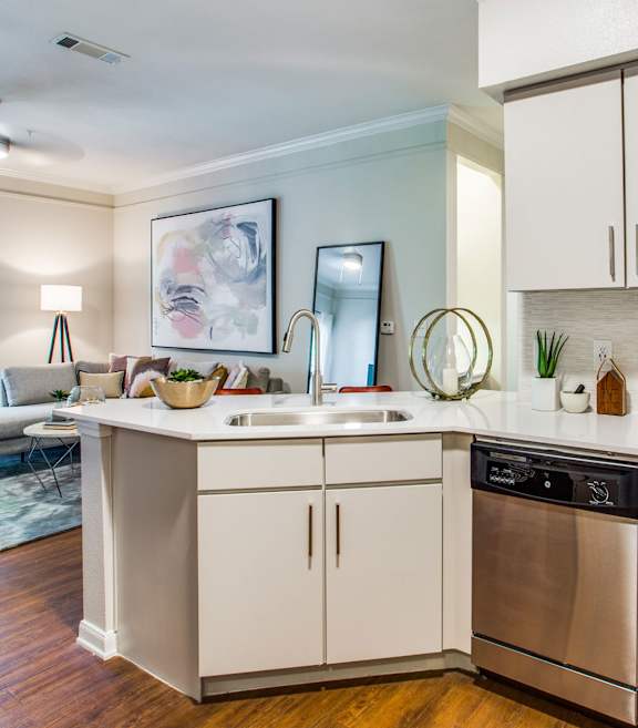 Kitchen with White Cabinets at Carrington at Barker Cypress in Cypress, TX 77433