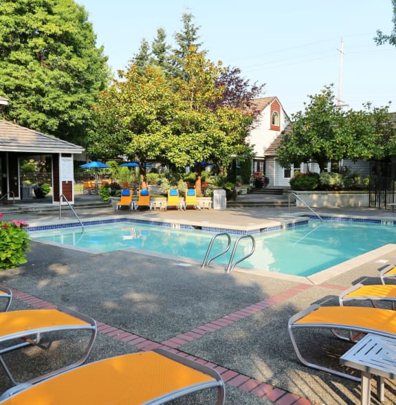 Fulton's Crossing and Landing Apartments in Everett, Washington Pool with Lounge Chairs