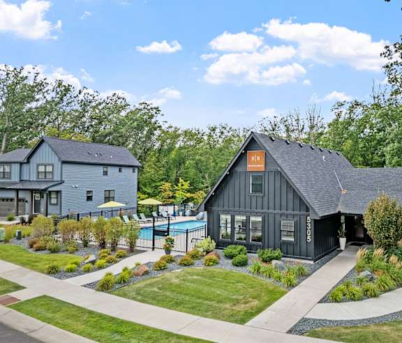 A house with a pool in the backyard.