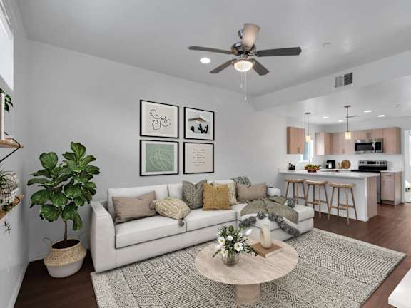 The Hedrick on Mountain Townhome Style Apartments in Tucson, Arizona Model Living Room and Kitchen