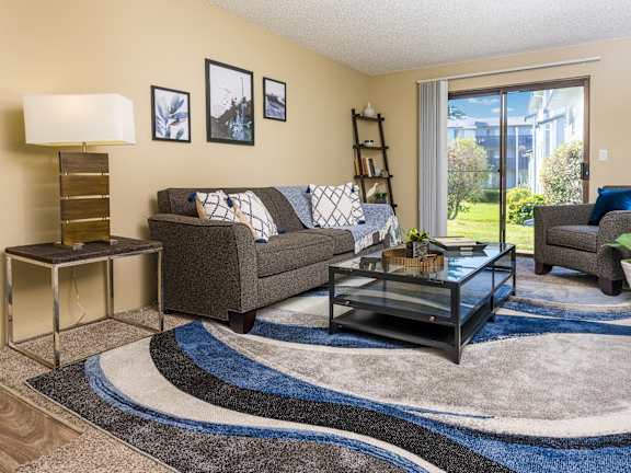 Copper Ridge Apartments in Renton, Washington Model Living Room with Private Patio