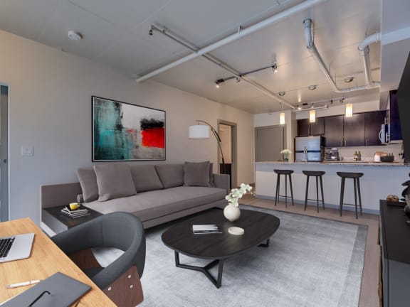 Koi Apartments in Ballard, Washington Model Living Room and Kitchen at Koi Apartments, Seattle, Washington