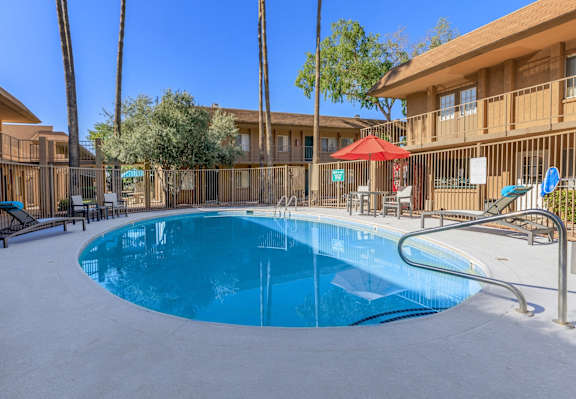 Country Club Terrace Apartments in Tucson, Arizona Pool with Lounge Chairs
