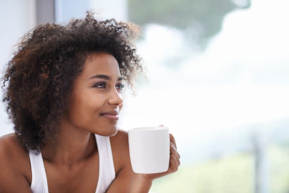 Woman Drinking Coffee at The Greens at Fort Mill, South Carolina, 29715
