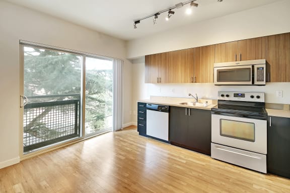 Haller Post Apartment Kitchens  feature stainless steel appliances.