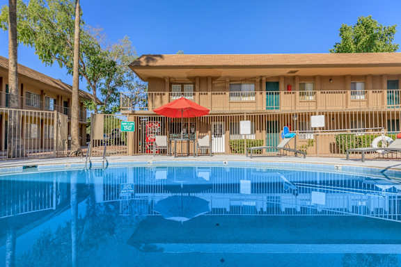 Country Club Terrace Apartments in Tucson, Arizona Pool with Lounge Chairs