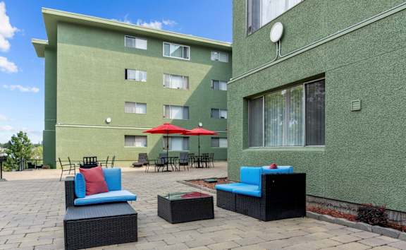 The Broadmoor Apartments in Spokane, Washington Exterior and Patio with Seating