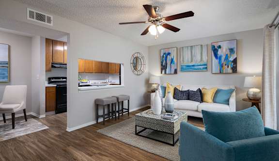 a kitchen with an island and stainless steel appliances