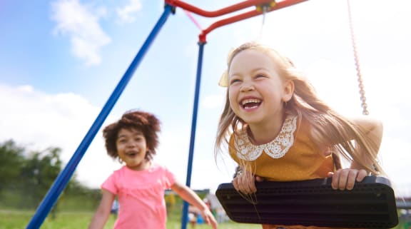 Girls on swing set