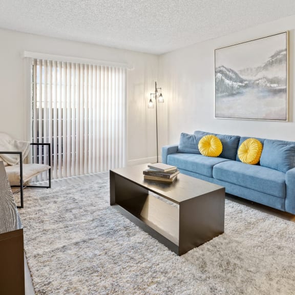 Proximity Apartment Homes in Salt Lake City, Utah Model Living Room with Private Patio