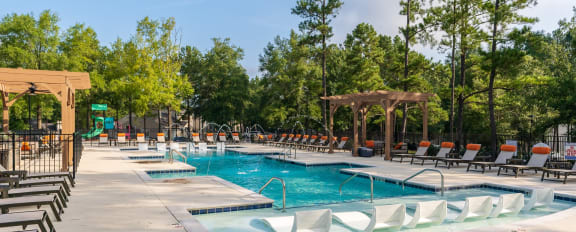 Zero-Entry Pool With Lounge Chairs In The Water