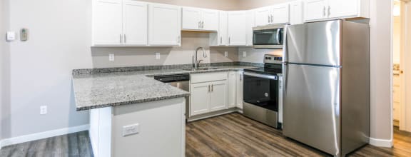 Fully Equipped Kitchen at Warehouse Apartments, North Dakota