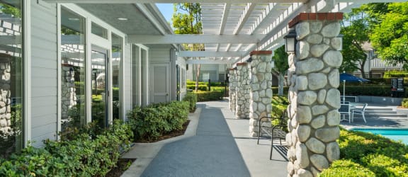 a picture of a house with a garden in front of it