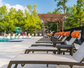 Lounge Chairs With Pillows At The Pool Sundeck