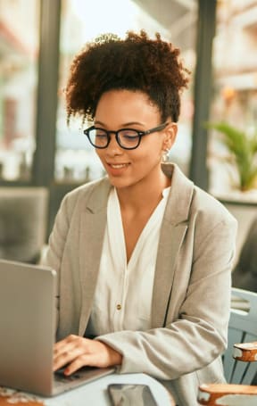 Young Professional on laptop at Lakeside at Arbor Place, Douglasville, GA