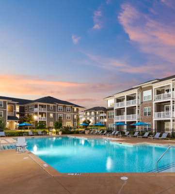 Swimming Pool View During Dusk at Abberly Market Point Apartment Homes, Greenville, SC 29607