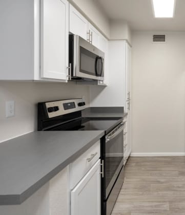 apartment kitchen with stainless steel appliances at Paseo 51, Glendale, 85302