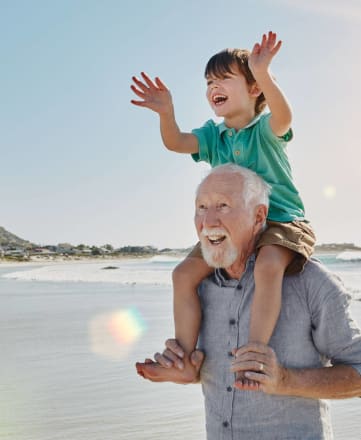 resident with family at the beach