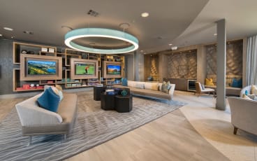 a large room with couches and chairs