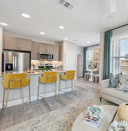 Alta Center Point Apartments in San Marcos, Texas Model Living Room and Kitchen