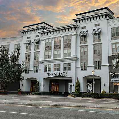 The front of a hotel called The Village.