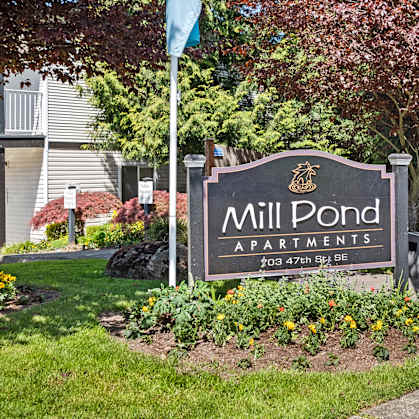 a sign that says mill pond apartments at Mill Pond Apartments, Auburn Washington