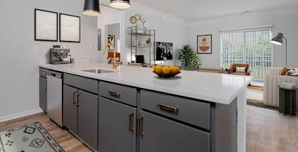 a large kitchen with a large counter top