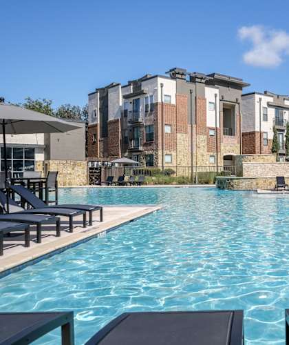 resort-inspired swimming pool at Soho Parkway apartments