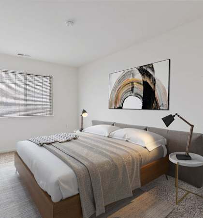 a bedroom with a bed and a window at Summit Creek, Canton, MI