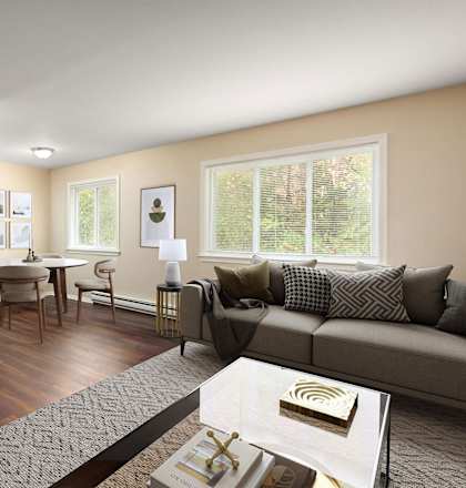 a living room with a couch and a table