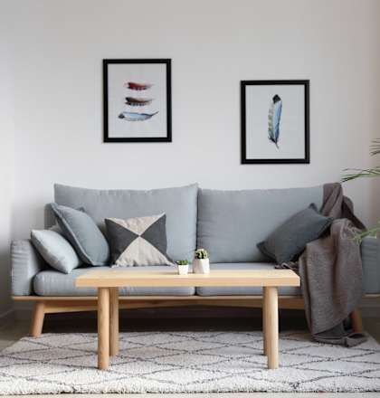 a living room with a couch and a coffee table