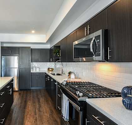 Apartments with Gas Stoves and Stainless Steel Appliances at F11 East Village in Downtown San Diego