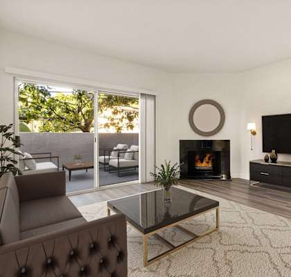 A modern living room with a fireplace and a flat screen TV.