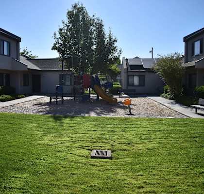 Twin Pines Mutual Housing Community courtyard and units, playground