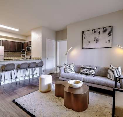 spacious open-concept kitchen and living room at South Blvd apartments