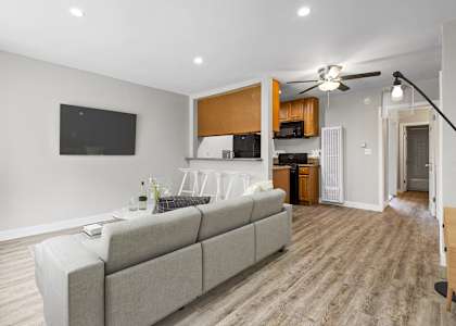 a living room with a couch and a tv