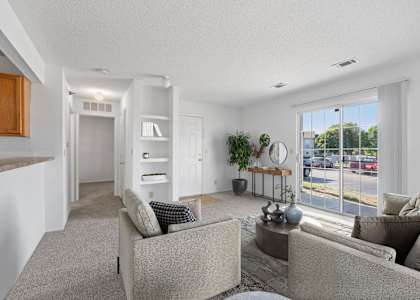 A living room with two couches and a coffee table.