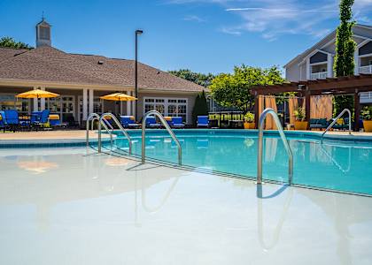 our resort style swimming pool with our building in the background