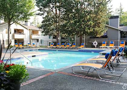 our apartments have a resort style pool with lounge chairs