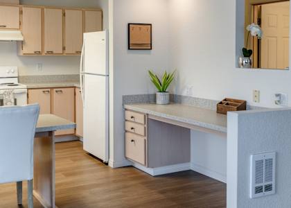Village on Broadway Apartments in Spokane Valley, Washington Model Kitchen with Built In Desk
