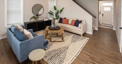 a living room with a couch and a table